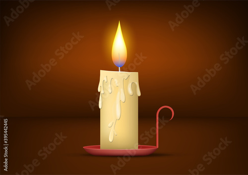 Realistic lighted christmas candle background.