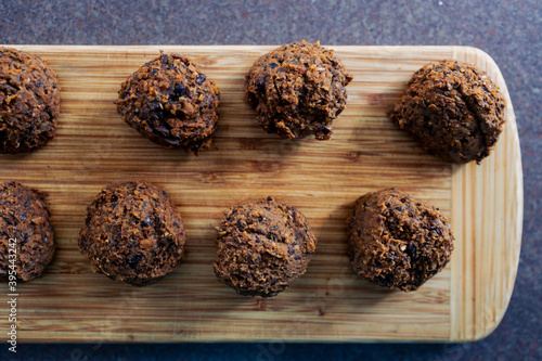plant-based food, vegan meatballs made of black beans mushroom mince and textured vegetable protein on cutting board