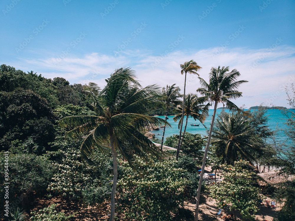 Top view aerial photo from flying drone of an amazing seascape with paradise beach and sea with turquoise water. Summer vacation holidays in Thailand. Perfect website background with copy space area Top view aerial photo from flying drone of an amazing seascape with paradise beach and sea with turquoise water. Summer vacation holidays in Thailand. Perfect website background with copy space area