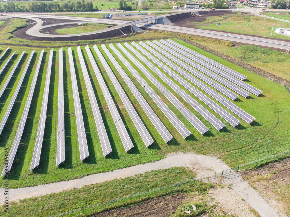 Aerial view of solar panels plant. Concept of clean and renewable energy.