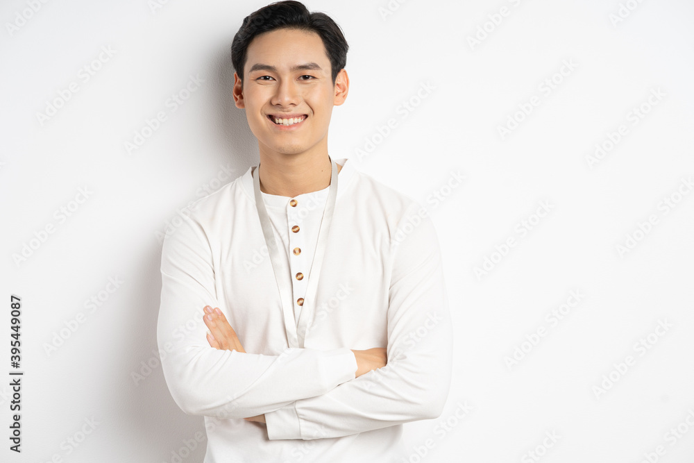 Asian businessman was crossing his arms and smiling confidently Asian businessman was crossing his arms and smiling confidently