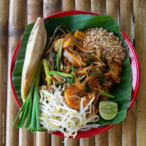 Top view of Thai treditional food, pad thai, serve on dish. photo