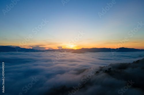 Nature landscape Aerial view drone. Mist landscape view point in south Thailand. Andaman Mist landscape view point. Amazing Mist landscape over mountain. At Khao Khai Nui, Phang Nga, Thailand. © BUDDEE