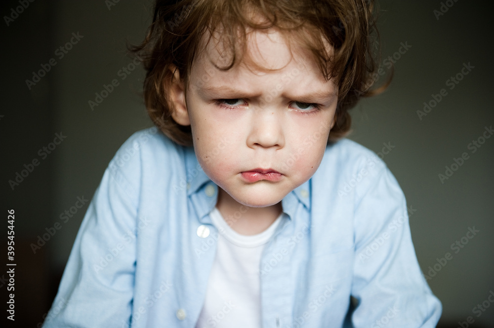 Funny emotional child makes a grimace. Funny emotional child makes a grimace.