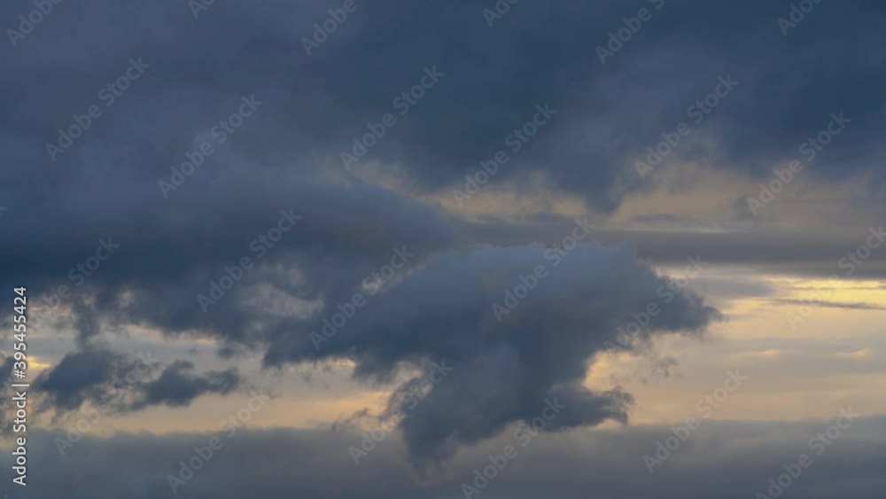 Dramatic storm cumulus clouds in evening sky, rainy and overcast weather. Beautiful natural meteorology background. 4K environment time-lapse. Dramatic storm cumulus clouds in evening sky, rainy and overcast weather. Beautiful natural meteorology background. 4K environment time-lapse.