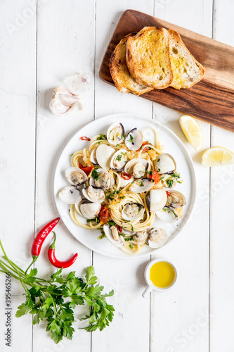 Mediterranean pasta with clams and chilli peppers photo