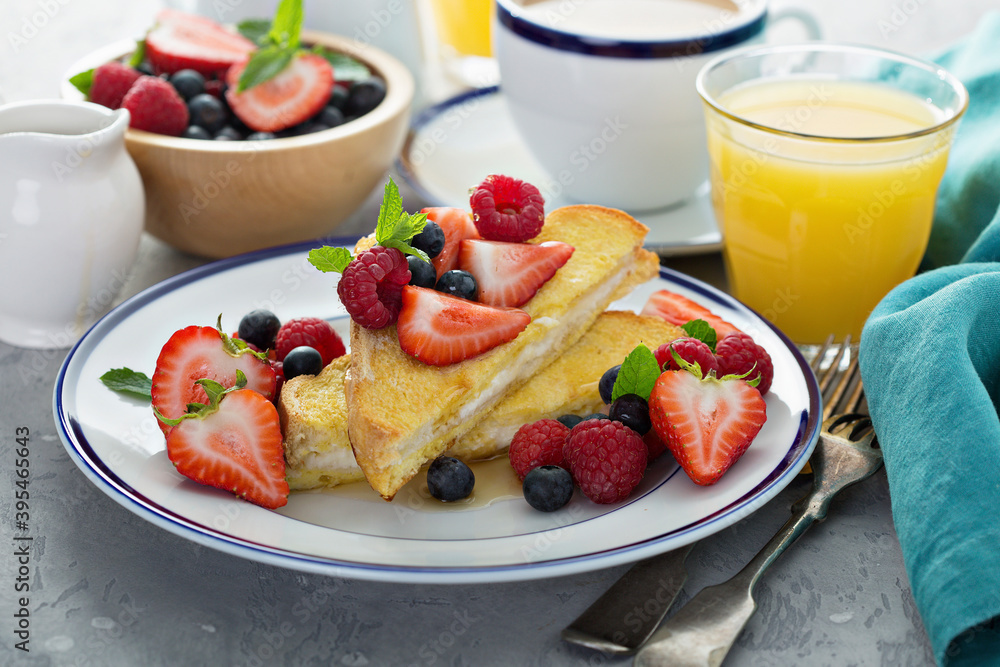Baked french toast with cream cheese filling and fresh berries Baked french toast with cream cheese filling and fresh berries