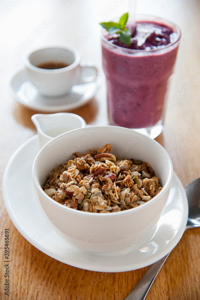 Breakfast muesli, a smoothie and coffee Breakfast muesli, a smoothie and coffee