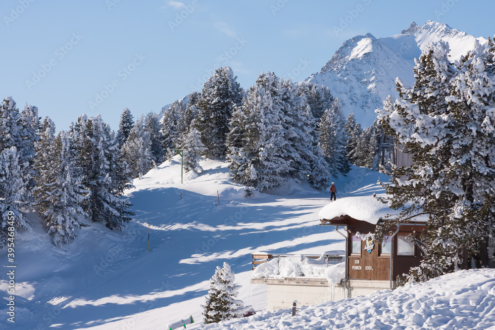Landscape with chalet house of Zillertal Arena ski resort in Tyrol in Mayrhofen in Austria in winter Alps. Penken ski area.