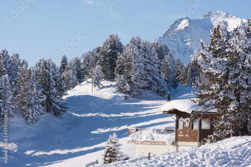 Fototapeta Naklejka Na Ścianę i Meble -  Landscape with chalet house of Zillertal Arena ski resort in Tyrol in Mayrhofen in Austria in winter Alps. Penken ski area.