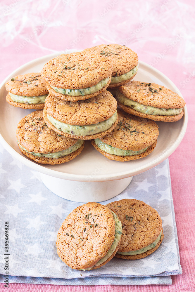 Spicy tomato macaroons with a green filling Spicy tomato macaroons with a green filling