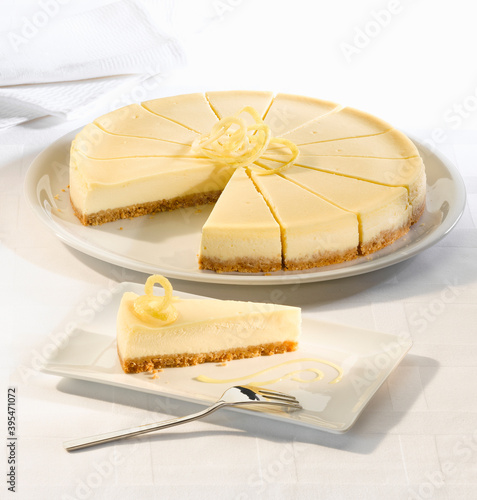 Lemon cheesecake with a biscuit base serves fourteen photo