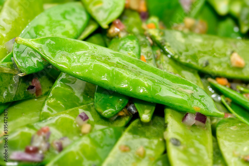 Mange tout with an onion dressing photo