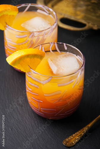 Two glasses filled with tropical guava punch photo