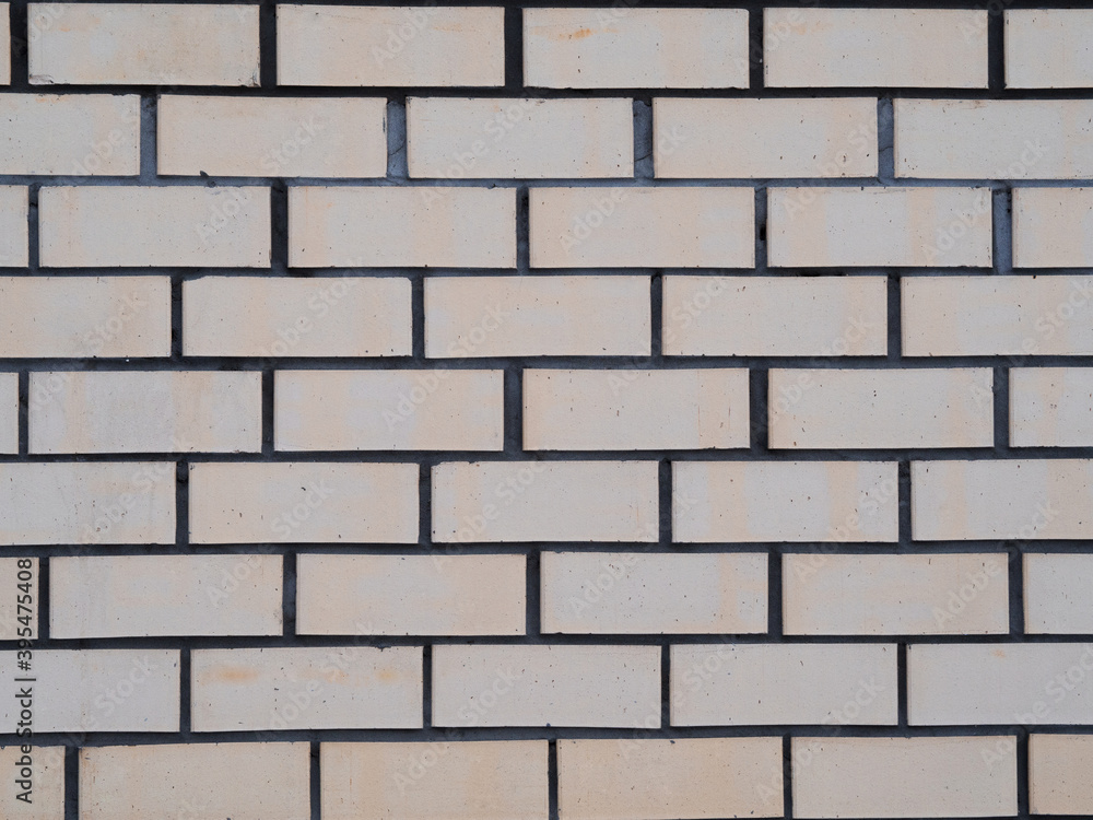 background wall made of bricks beige and gray cement background wall made of bricks beige and gray cement