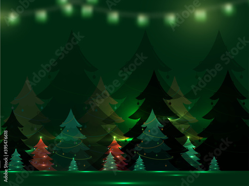 Decorative Xmas Trees With Lights Effect On Green Background.