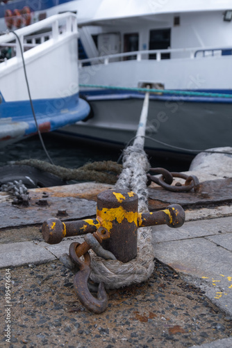 bollard and rope on the pier, makefast photo