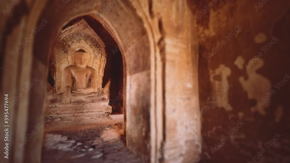 statue of sitting Buddha inside an untitled simple temple in Bagan Myanmar statue of sitting Buddha inside an untitled simple temple in Bagan Myanmar