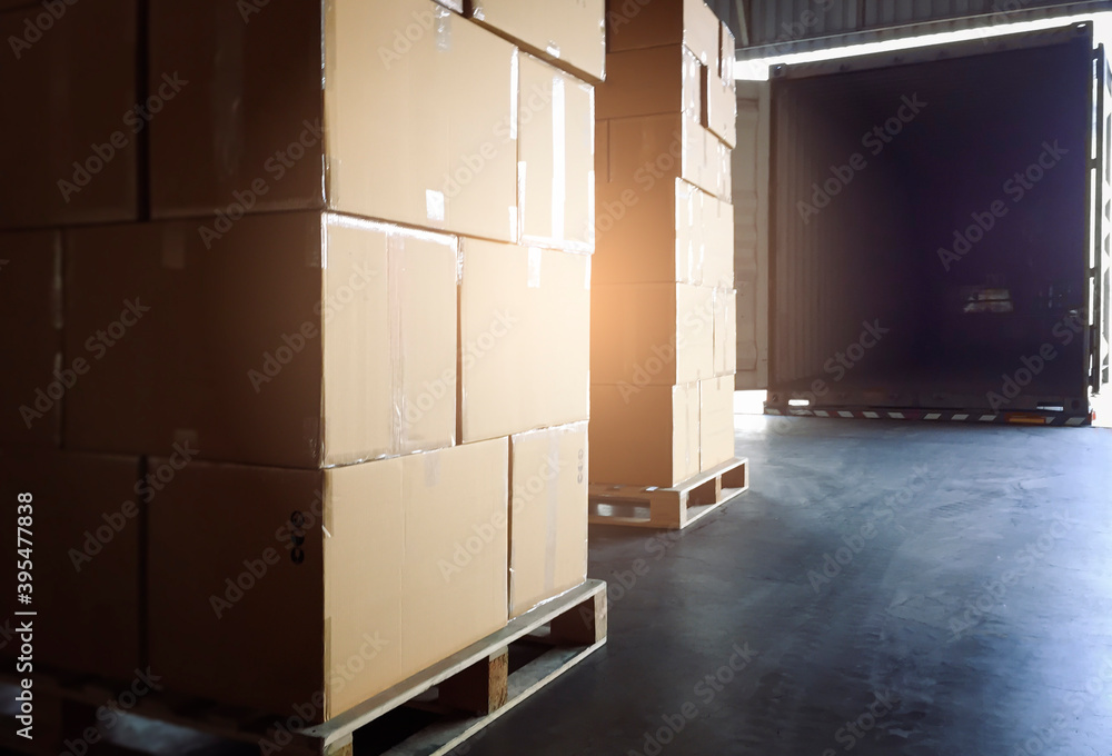 Cargo shipment package boxes, Freight truck, Warehousing. Stack of