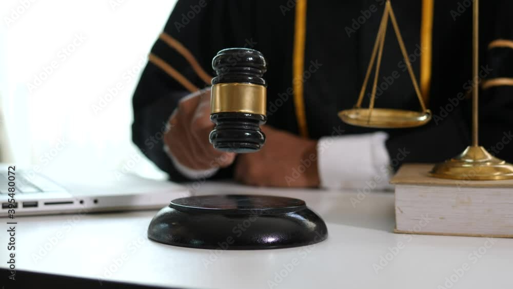 Male lawyer or judge consult having team meeting with client, Law and Legal services concept Male lawyer or judge consult having team meeting with client, Law and Legal services concept