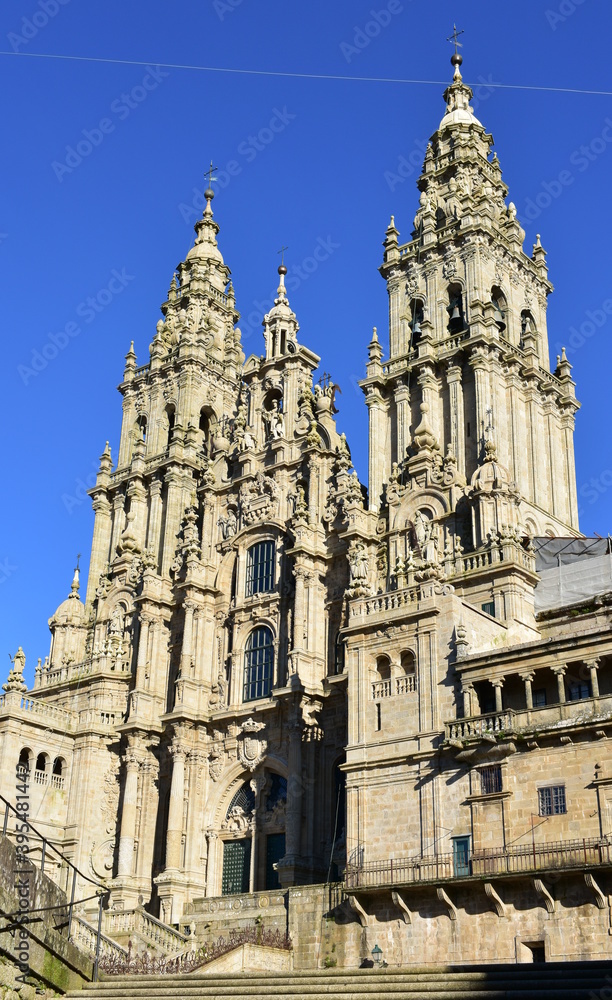 Cathedral, facade view from Praza do Obradoiro with blue sky. Santiago de Compostela, Galicia, Spain, Europe.