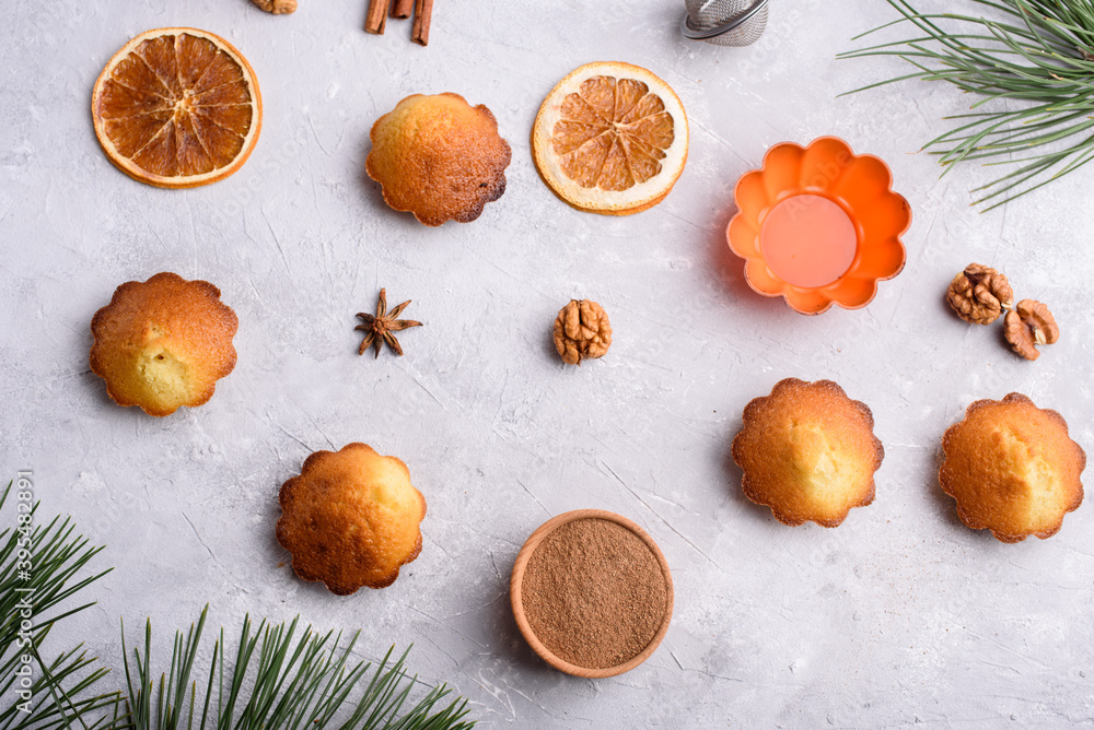 Delicious fragrant vanilla cupcakes on a light background. A place for text, a view from above. Recipes. Delicious fragrant vanilla cupcakes on a light background. A place for text, a view from above. Recipes.