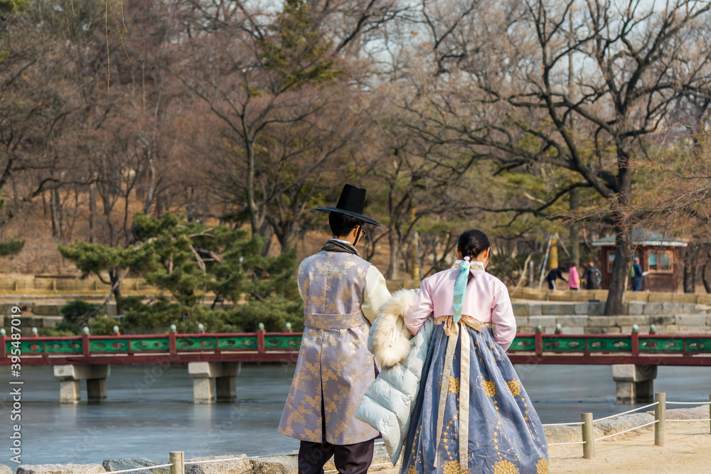Tourists wearing traditional Korean clothes Hanbok at the Gyeongbokgung Gyeongbokgung Palace or Gyeongbok Palace, the main royal palace of Joseon dynasty.