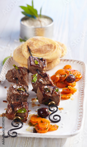 Espetada madeirense: beef skewers with sweet potato bread and Portuguese carrot salad photo