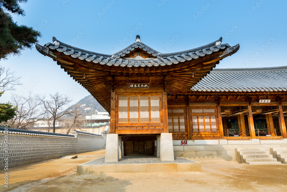Fototapeta premium Korean wooden traditional house with black tiles in Gyeongbokgung, also known as Gyeongbokgung Palace or Gyeongbok Palace, the main royal palace of Joseon dynasty.