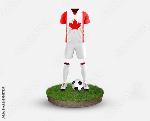 Canada soccer player standing on football grass, wearing a national flag uniform. Football concept. championship and world cup theme. photo