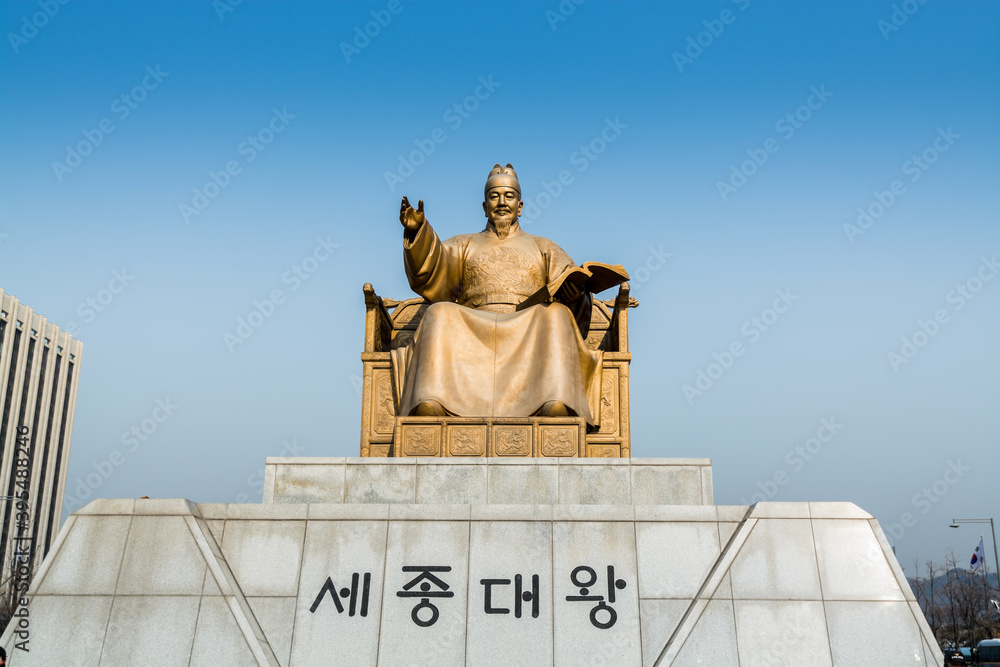 Naklejka premium Statue of the Sejong daewang, also called the Sejong the Great, the fourth king of Joseon-dynasty of Korea, and the alphabet of Korean Language