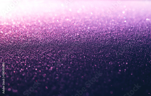 Purple glitter sparkling festive background. Abstract Christmas 