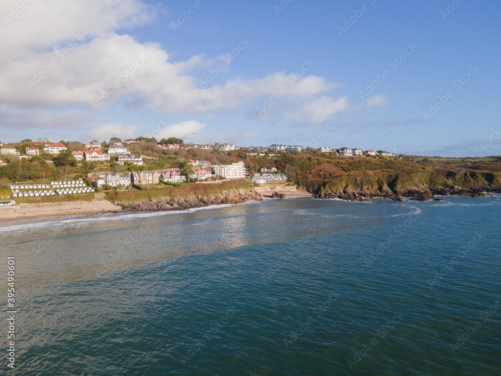 Looking Into Langland Bay in Gower, Wales, UK from the sea on a clean late Autumn day. Blue skies with some clouds