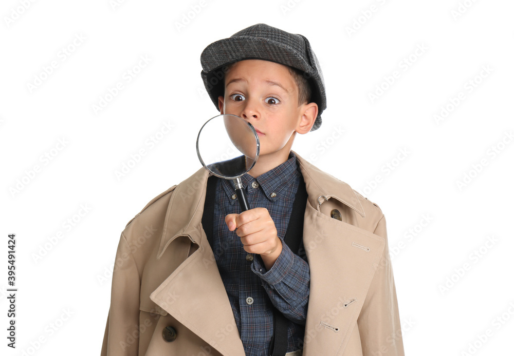 Little boy with magnifying glass playing detective on white background Little boy with magnifying glass playing detective on white background