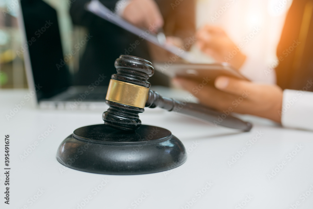 Male lawyer or judge consult having team meeting with client, Law and Legal services concept Male lawyer or judge consult having team meeting with client, Law and Legal services concept