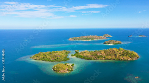 Tropical island with sandy beach on the Zamboanga Peninsula. Sallangan Islands, Simoadang Island. Mindanao, Philippines.