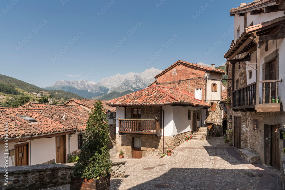Clear sky over historic old traditional buildings with tiled roofs in Potes, Cantabria, Spain