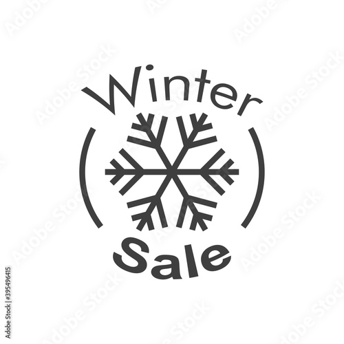 Rebajas de invierno. Logotipo texto Winter Sale con copo de nieve en círculo con lineas en color gris