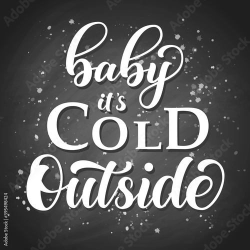 Baby it's cold outside brush hand lettering, on blackboard background. Vector type chalk illustration. Can be used for holidays festive design.