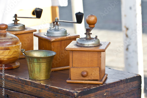 Old italian wooden Coffee grinder exhibited in a street flea market