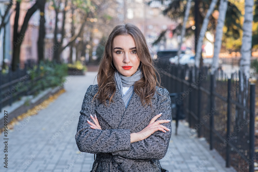 Portrait of a beautiful and happy girl outdoors. Beauty and fashion Portrait of a beautiful and happy girl outdoors. Beauty and fashion