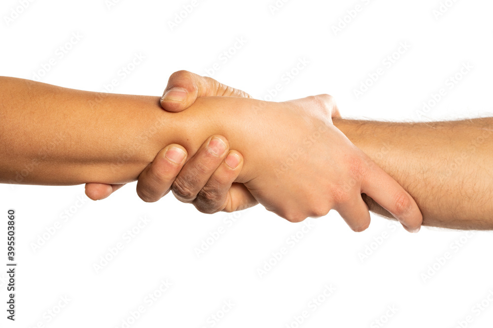 Male and female hands holding each other, isolated on white background.