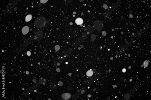 snow bokeh texture on black background