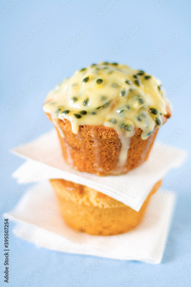 Two glazed passionfruit muffins Two glazed passionfruit muffins