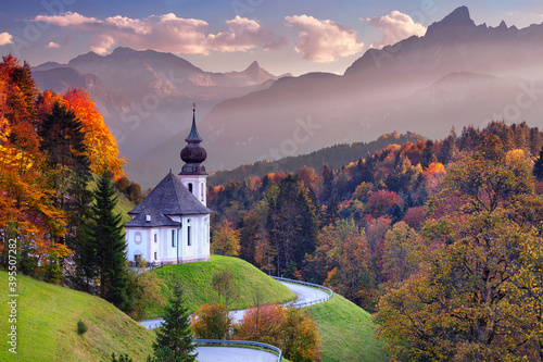 Obraz na płótnie Bavarian Alps. Landscape image of the Bavarian Alps with Maria Gern Church and Watzmann mountain during beautiful autumn sunset. w salonie