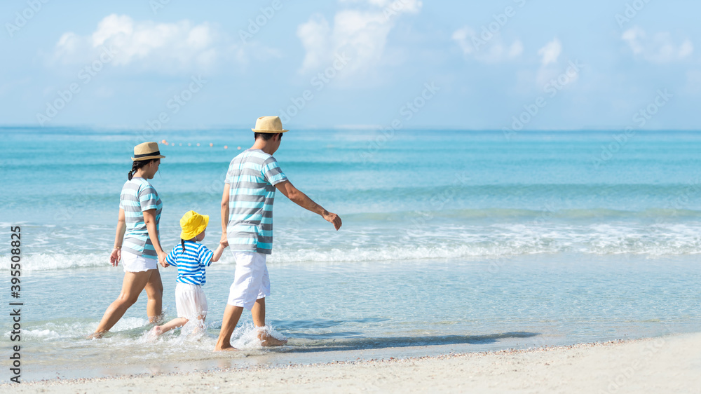 Happy family summer sea beach vacation. Asia young people lifestyle travel enjoy fun and relax leisure destination in holiday.