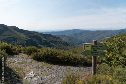 Courel mountain landscape and hiking sign with copy space photo