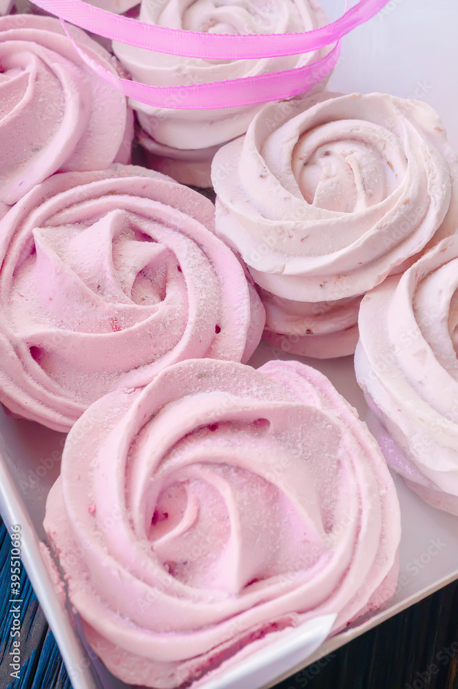 fresh handmade marshmallows in a light mood. Close-up of a pink marshmallow in a box for sale. Sale of handmade confectionery fresh handmade marshmallows in a light mood. Close-up of a pink marshmallow in a box for sale. Sale of handmade confectionery