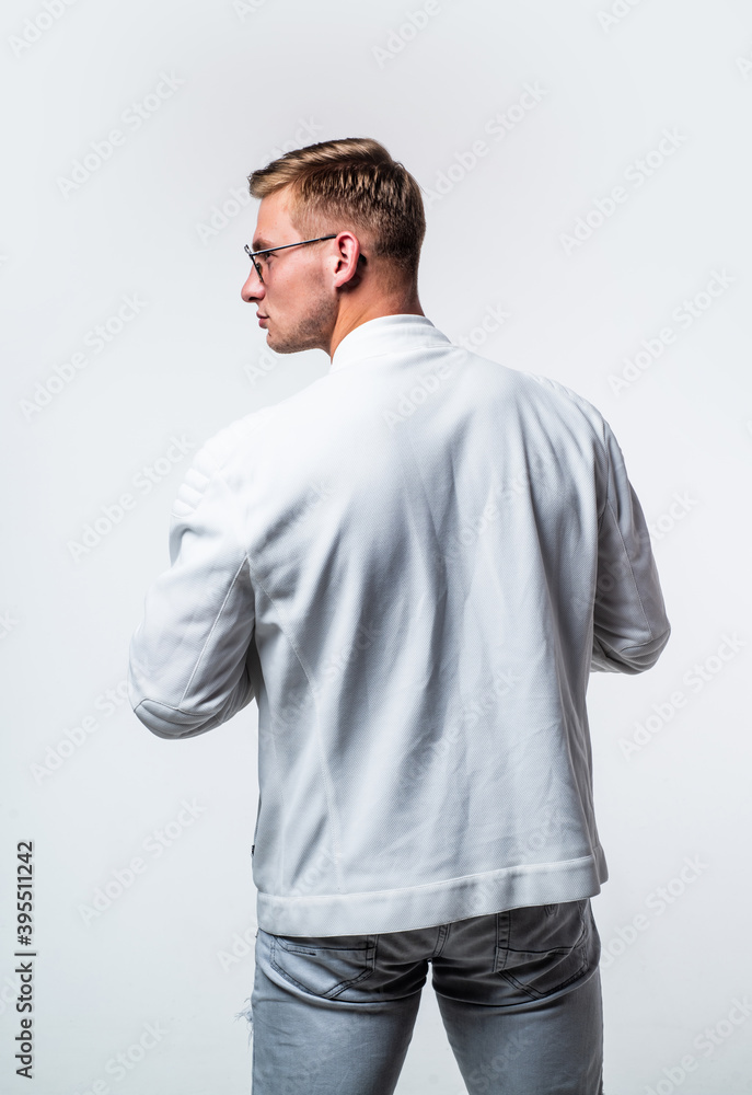 The key to menswear looking good is fit. Young man wear casual style, back view. Menswear collection. Fashion trend. Mens clothing. Masculine attire. Stylish and confident The key to menswear looking good is fit. Young man wear casual style, back view. Menswear collection. Fashion trend. Mens clothing. Masculine attire. Stylish and confident