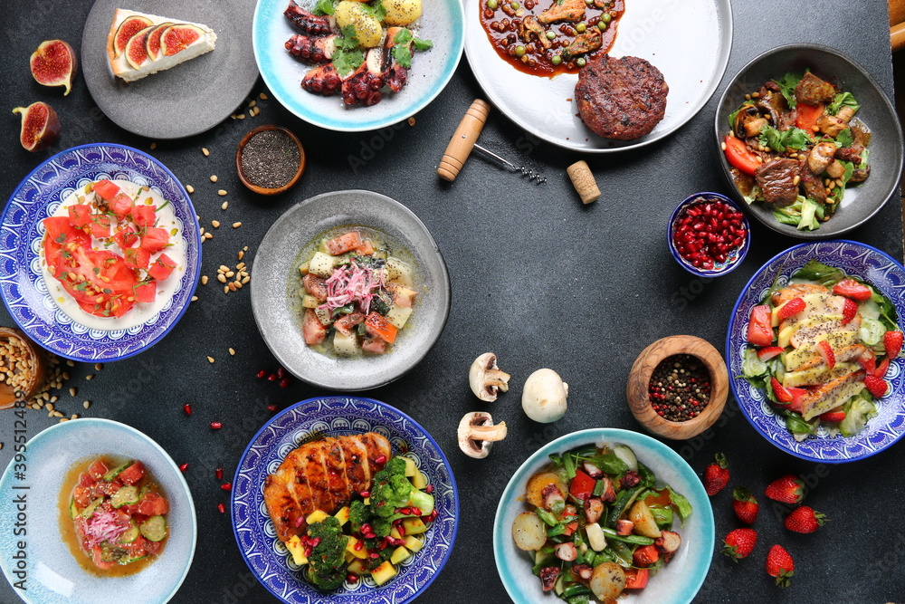 table full of food top view. Set of dishes on the table. meat salad and dessert on table top view table full of food top view. Set of dishes on the table. meat salad and dessert on table top view